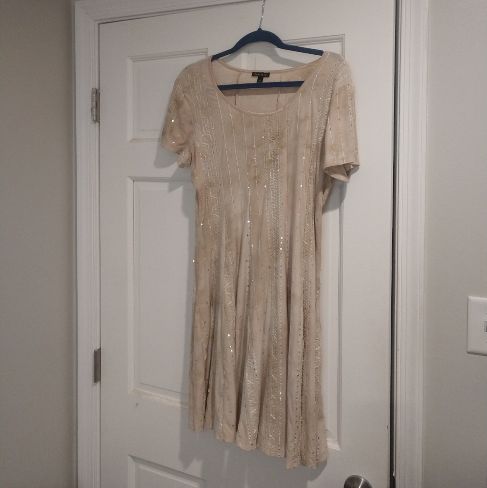 Sami & Jo dress cream colored with sequins and other details